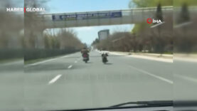 Canını hiçe sayıp motosikleti üzerine uzanarak sürdü